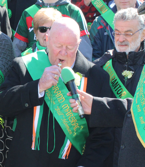 Grand Marshall  Bill Homan blew the whistle to begin the Parade